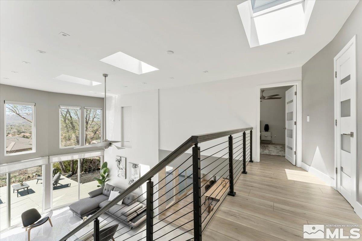 2665 Westview Boulevard Sparks, NV 89434 - Photo 6 of 33 a view of an entryway with wooden floor and windows