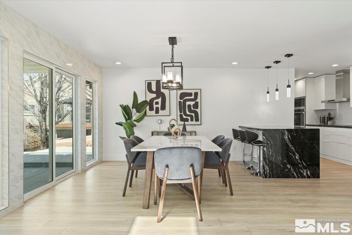 2665 Westview Boulevard Sparks, NV 89434 - Photo 10 of 33 a view of a dining room with furniture window and wooden floor