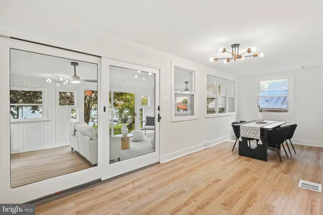 a view of a livingroom with furniture and wooden floor