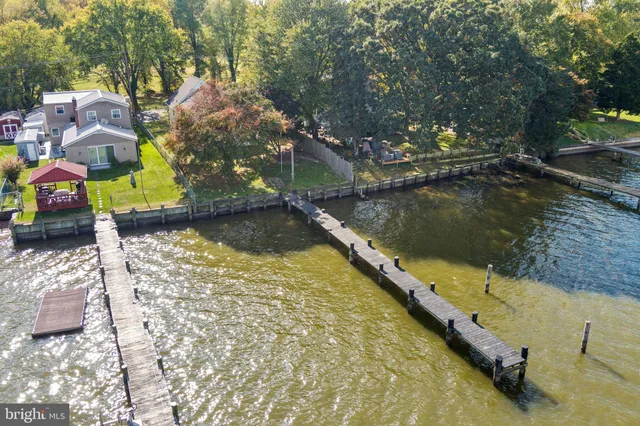 a view of swimming pool with a yard