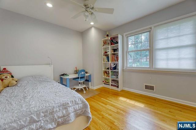 230 Pinelynn Road Glen Rock, NJ 07452 - Photo 13 of 19 a bedroom with a bed furniture and a window