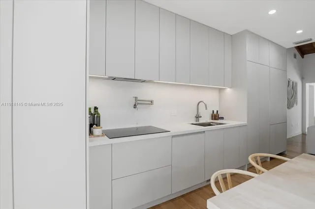 a view of a kitchen with washer and dryer