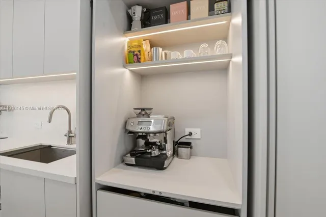 a close view of a utility room with washer and dryer
