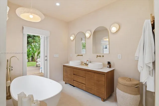 a bathroom with a granite countertop shower