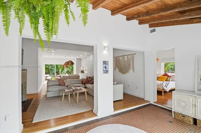 a living room with furniture and a table