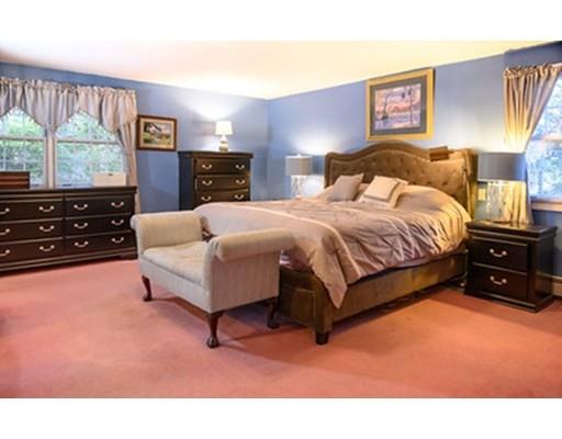 250 Edgewater Drive Needham, MA 02492 - Photo 12 of 27 a bedroom with a bed and window