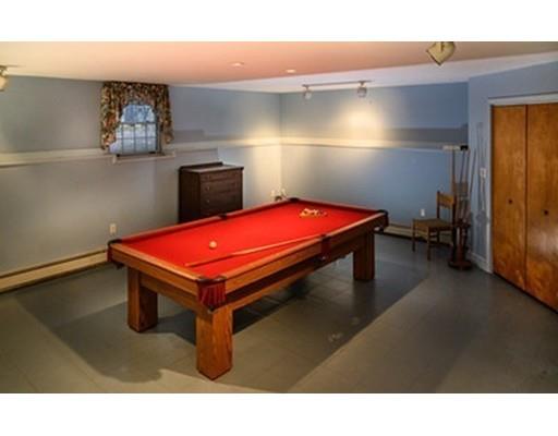 250 Edgewater Drive Needham, MA 02492 - Photo 18 of 27 a room with pool table and two mirrors