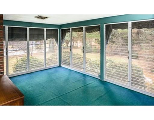 250 Edgewater Drive Needham, MA 02492 - Photo 19 of 27 a black and white photo of a garden