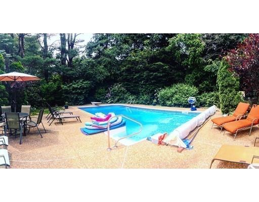 250 Edgewater Drive Needham, MA 02492 - Photo 20 of 27 a view of swimming pool with a patio