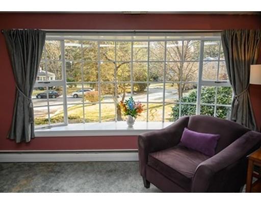 250 Edgewater Drive Needham, MA 02492 - Photo 5 of 27 a room with furniture and a large window