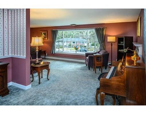 250 Edgewater Drive Needham, MA 02492 - Photo 6 of 27 a room with furniture and a large window