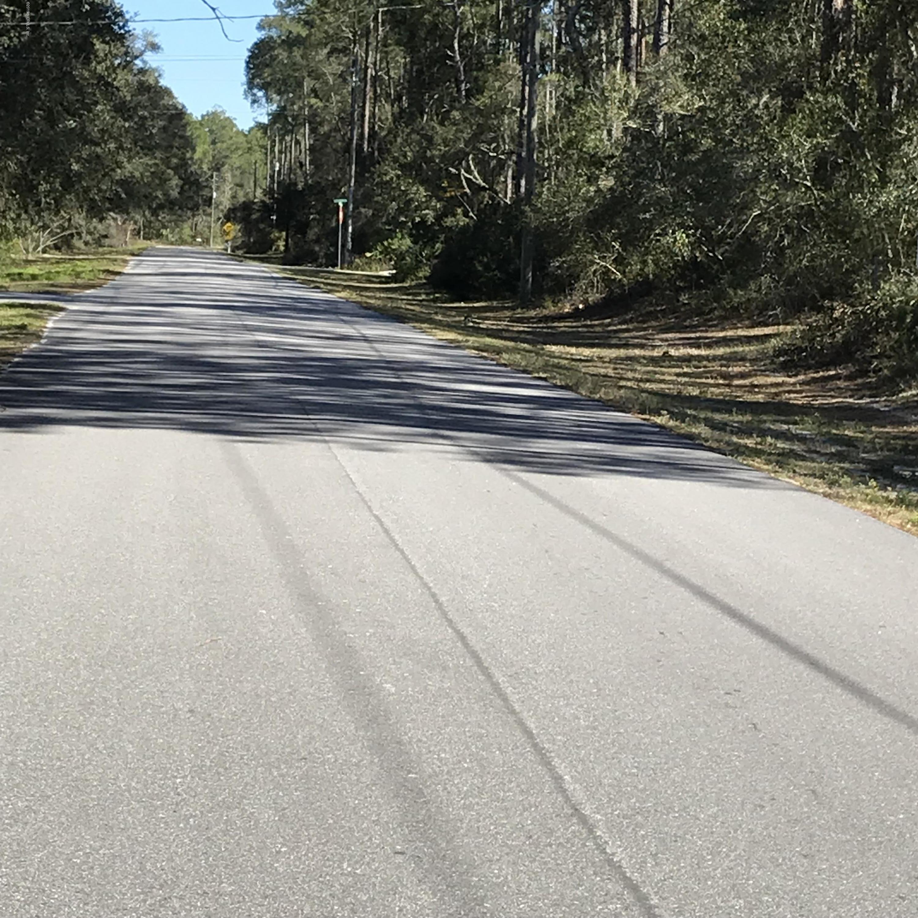 202 Whispering Pines Road Georgetown, FL 32139 - Photo 7 of 7 a view of a houses with a yard