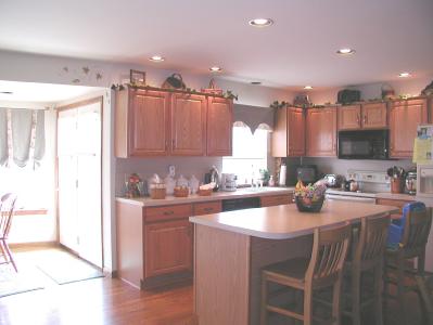 1016 Capp Road Nazareth, PA 18064 - Photo 2 of 7 a kitchen with kitchen island granite countertop a sink and cabinets