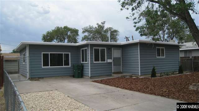 1740 Haddock Drive Reno, NV 89512 - Photo 1 of 9 a front view of a house with a yard