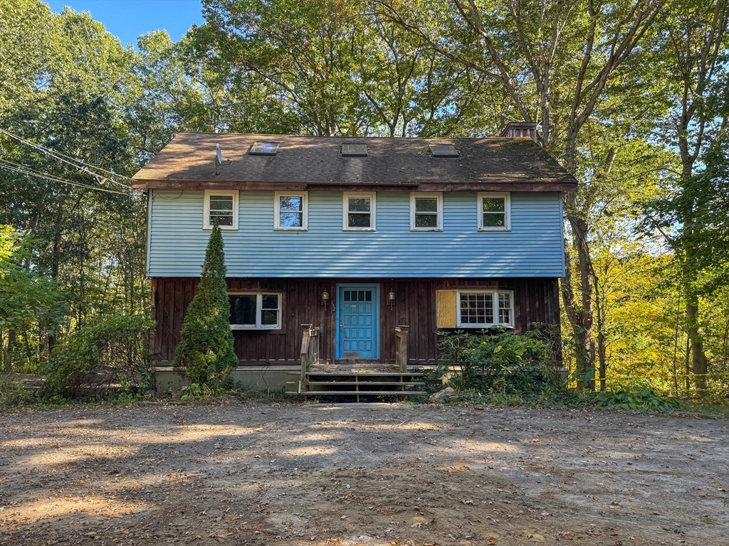 132 Kilbourn Road Lancaster, MA 01523 - Photo 2 of 15 a front view of a house with garden