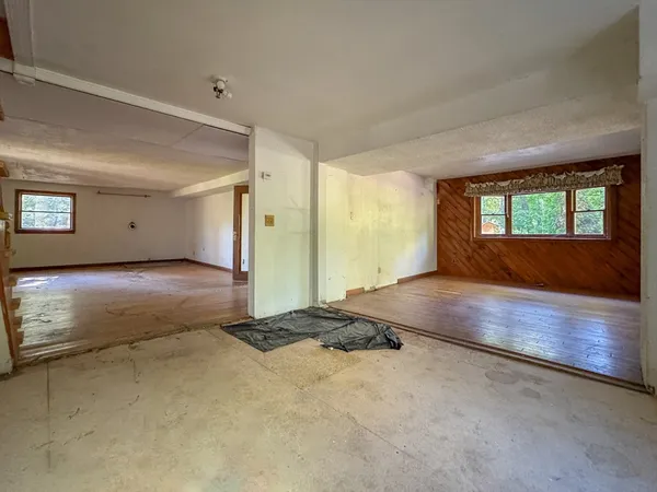 a view of an empty room and window
