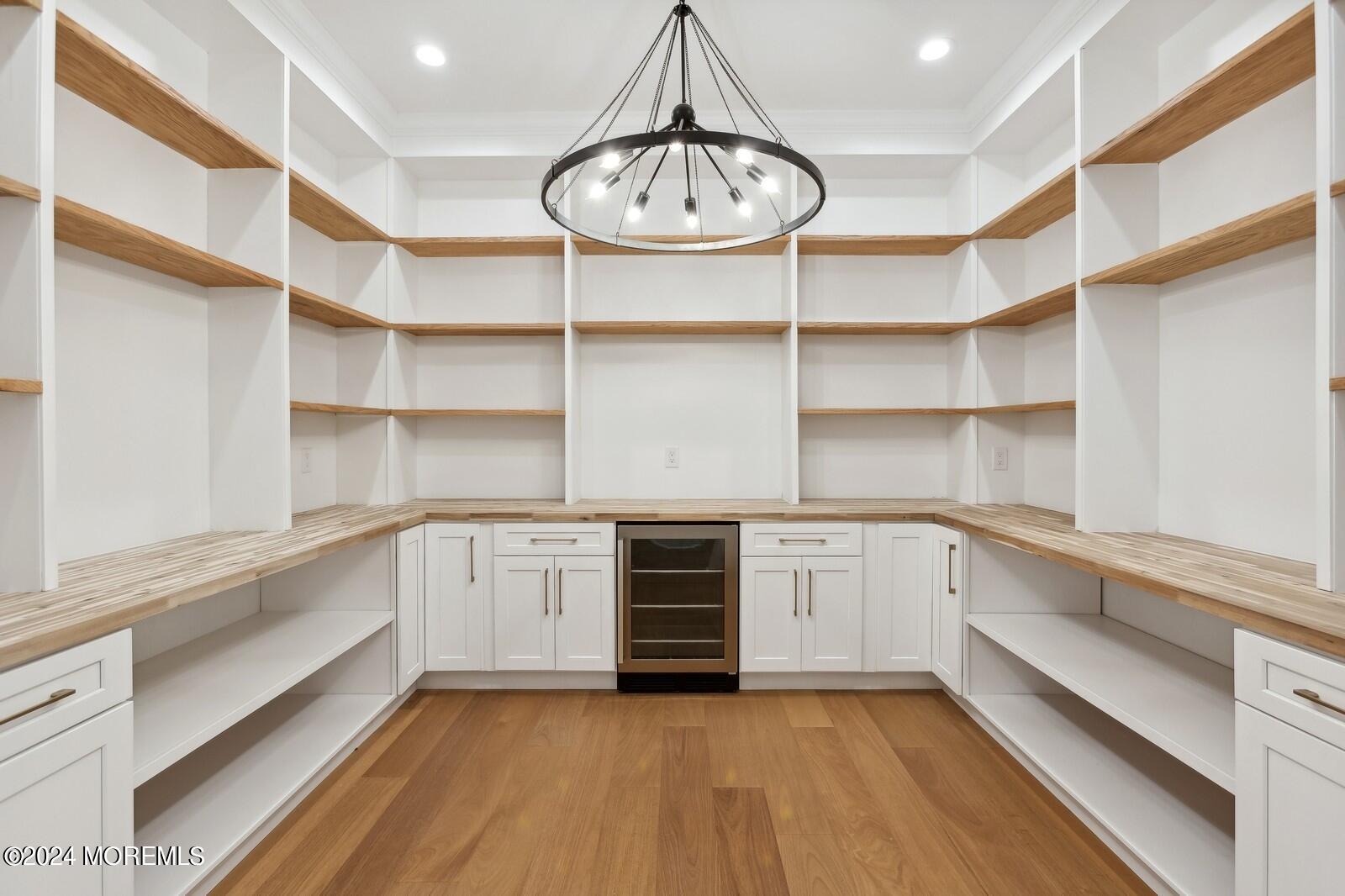 16 Round Hill Holmdel, NJ 07733 - Photo 23 of 60 a kitchen with white cabinets and window