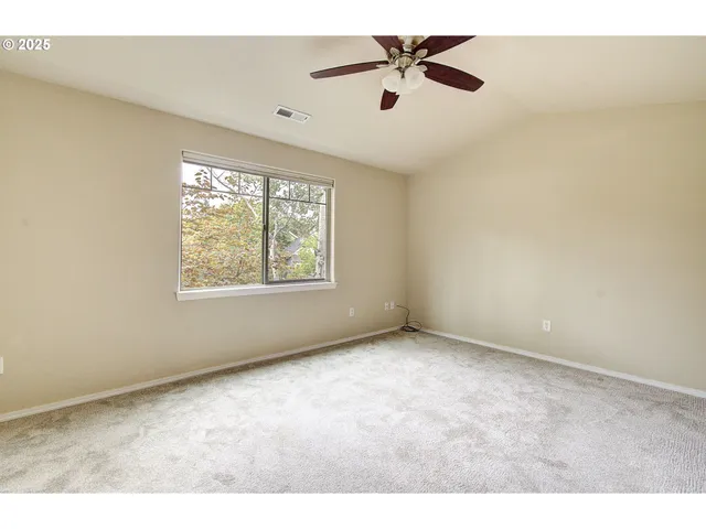 a view of a big room with wooden floor