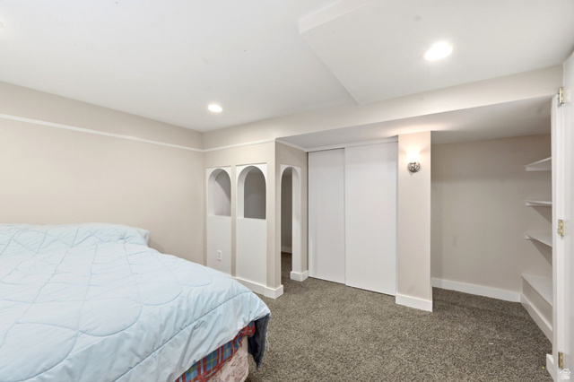 310 East 600 South Centerville, UT 84014 - Photo 24 of 41 Recessed lighting illuminates a room featuring light-colored walls and carpeted flooring