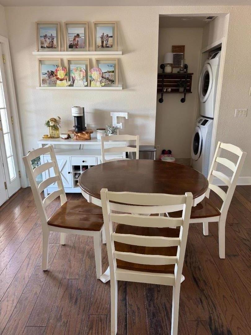 2253 Buffalo Way Copperopolis, CA 95228 - Photo 14 of 39 a kitchen with granite countertop a table chairs and wooden floor