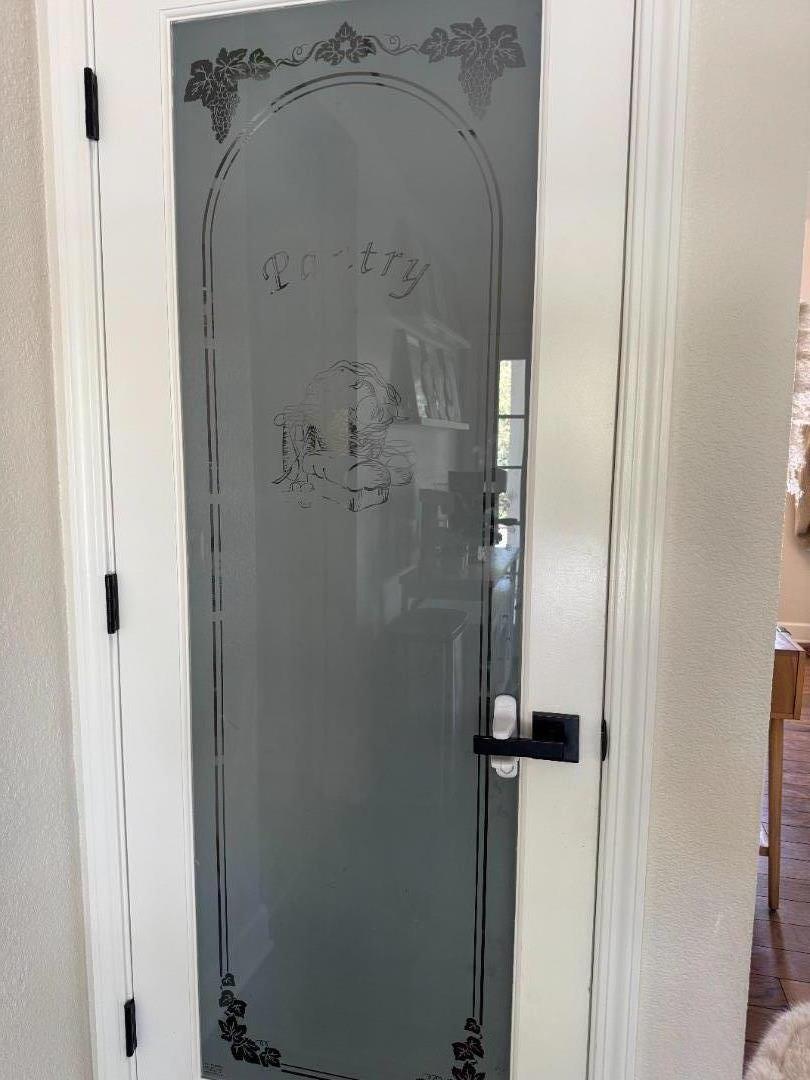 2253 Buffalo Way Copperopolis, CA 95228 - Photo 16 of 39 a bathroom with a glass shower door