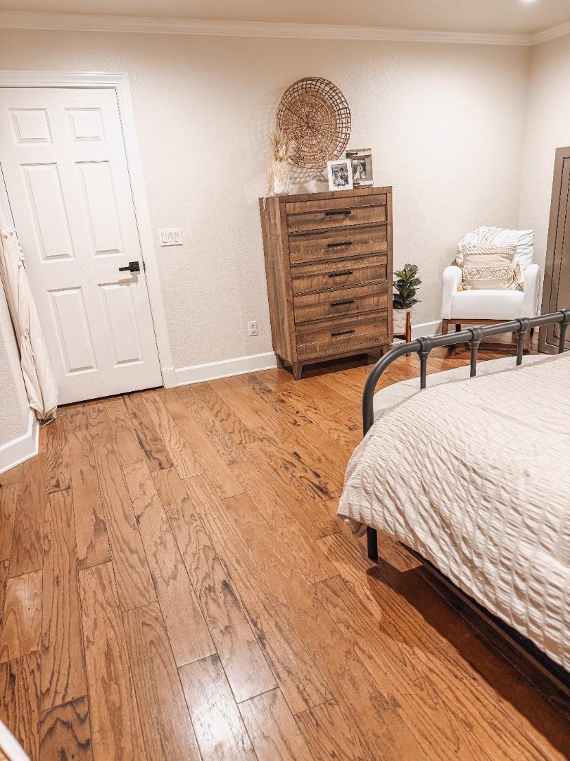 2253 Buffalo Way Copperopolis, CA 95228 - Photo 20 of 39 a bedroom with a bed and dresser