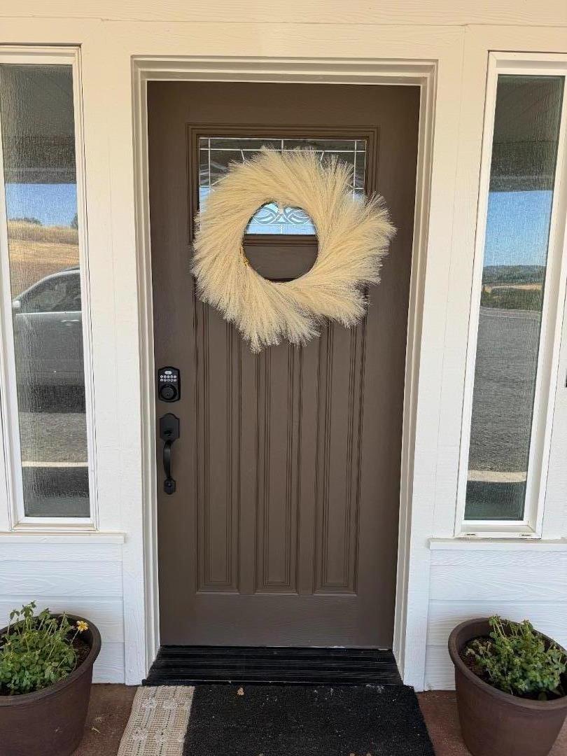 2253 Buffalo Way Copperopolis, CA 95228 - Photo 2 of 39 a door view with a sink