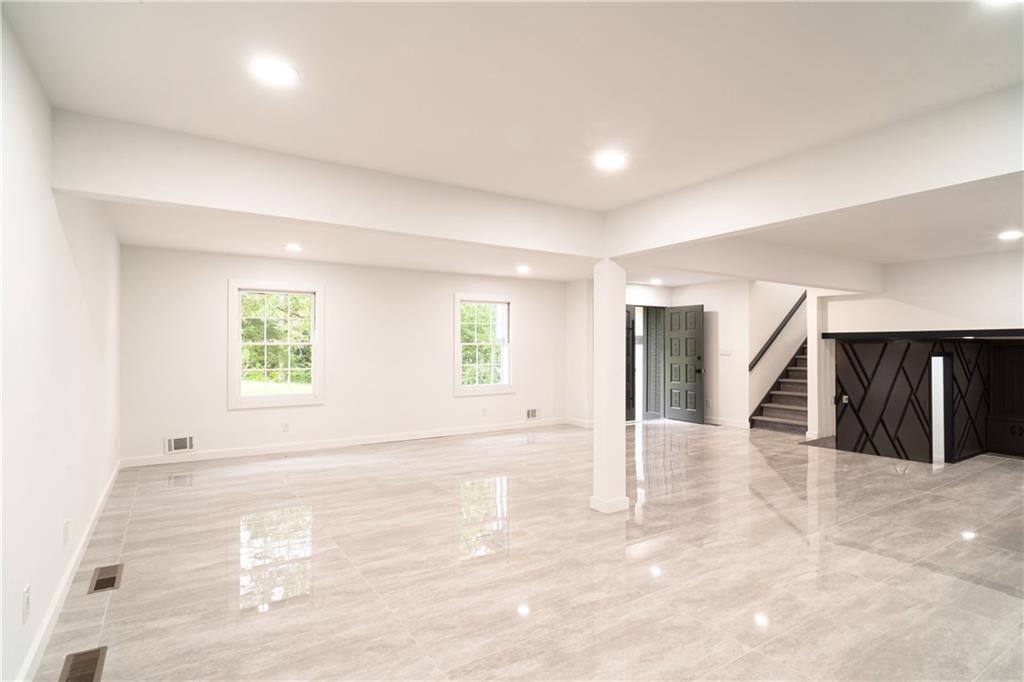 69 Hearn Road Ellenwood, GA 30294 - Photo 14 of 19 an empty room with windows and entrance