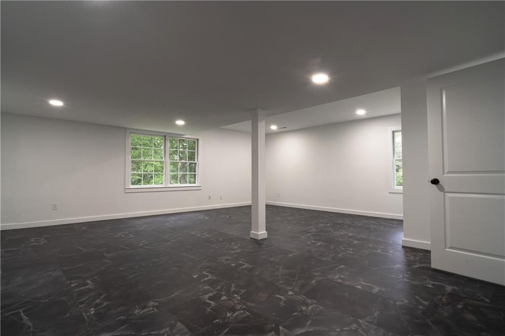 69 Hearn Road Ellenwood, GA 30294 - Photo 16 of 19 an empty room with windows