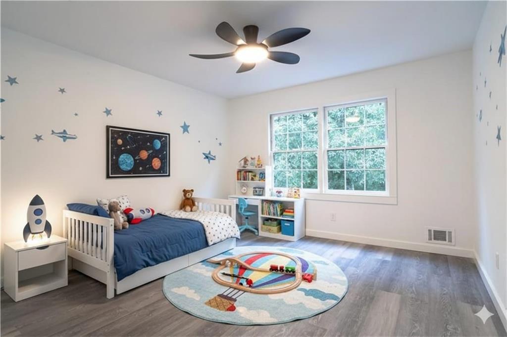 69 Hearn Road Ellenwood, GA 30294 - Photo 5 of 19 a living room with furniture and a table