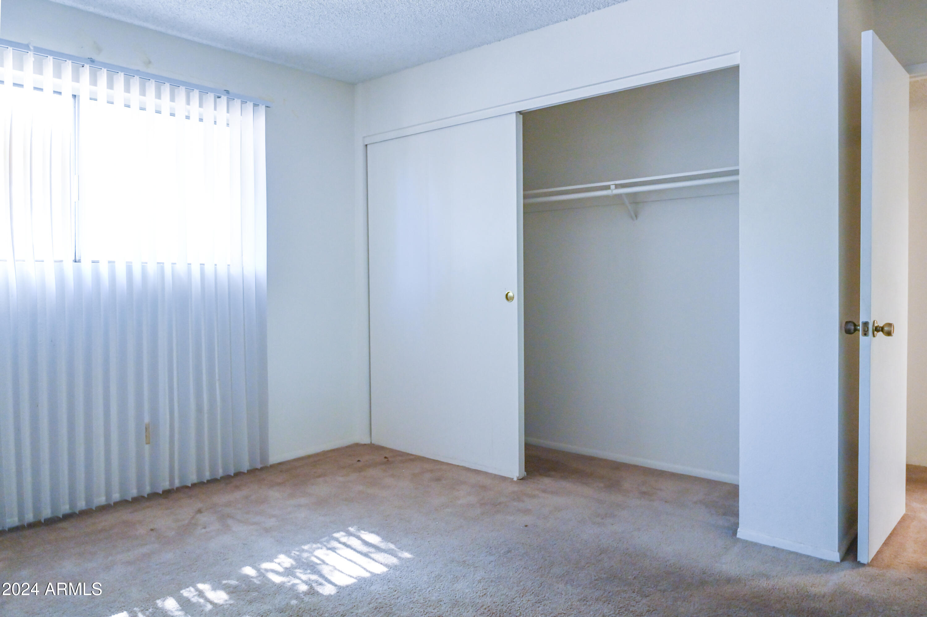 5525 East Thomas Road, Unit K4 Phoenix, AZ 85018 - Photo 11 of 27 Primary Bedroom