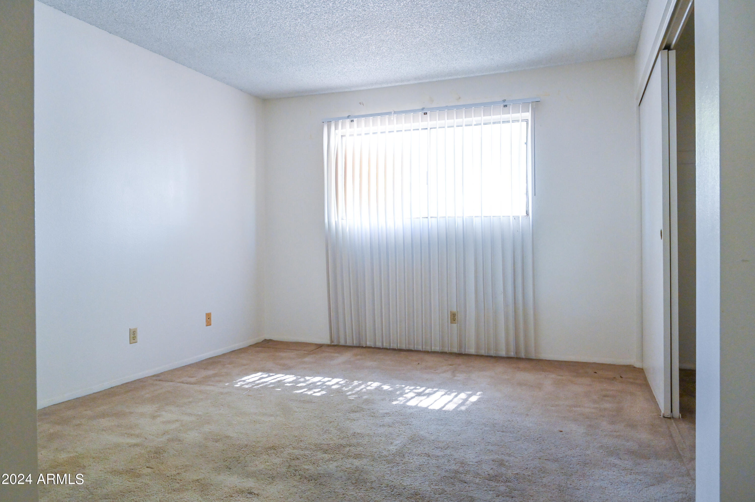5525 East Thomas Road, Unit K4 Phoenix, AZ 85018 - Photo 10 of 27 Primary Bedroom