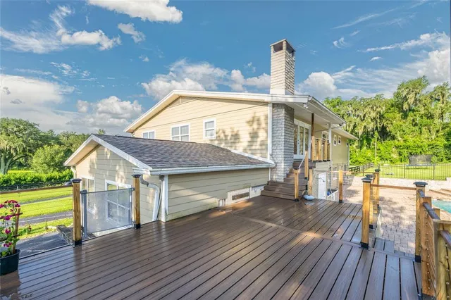an aerial view of a house with a garden