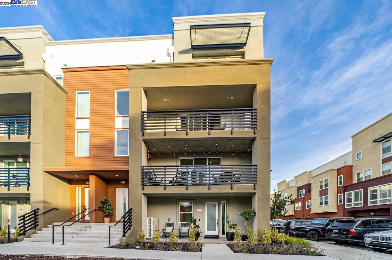 a front view of a building with parking