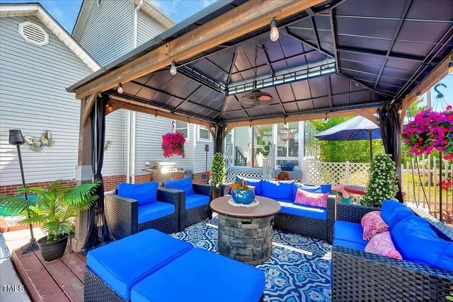 a outdoor space with patio couches and a potted plant