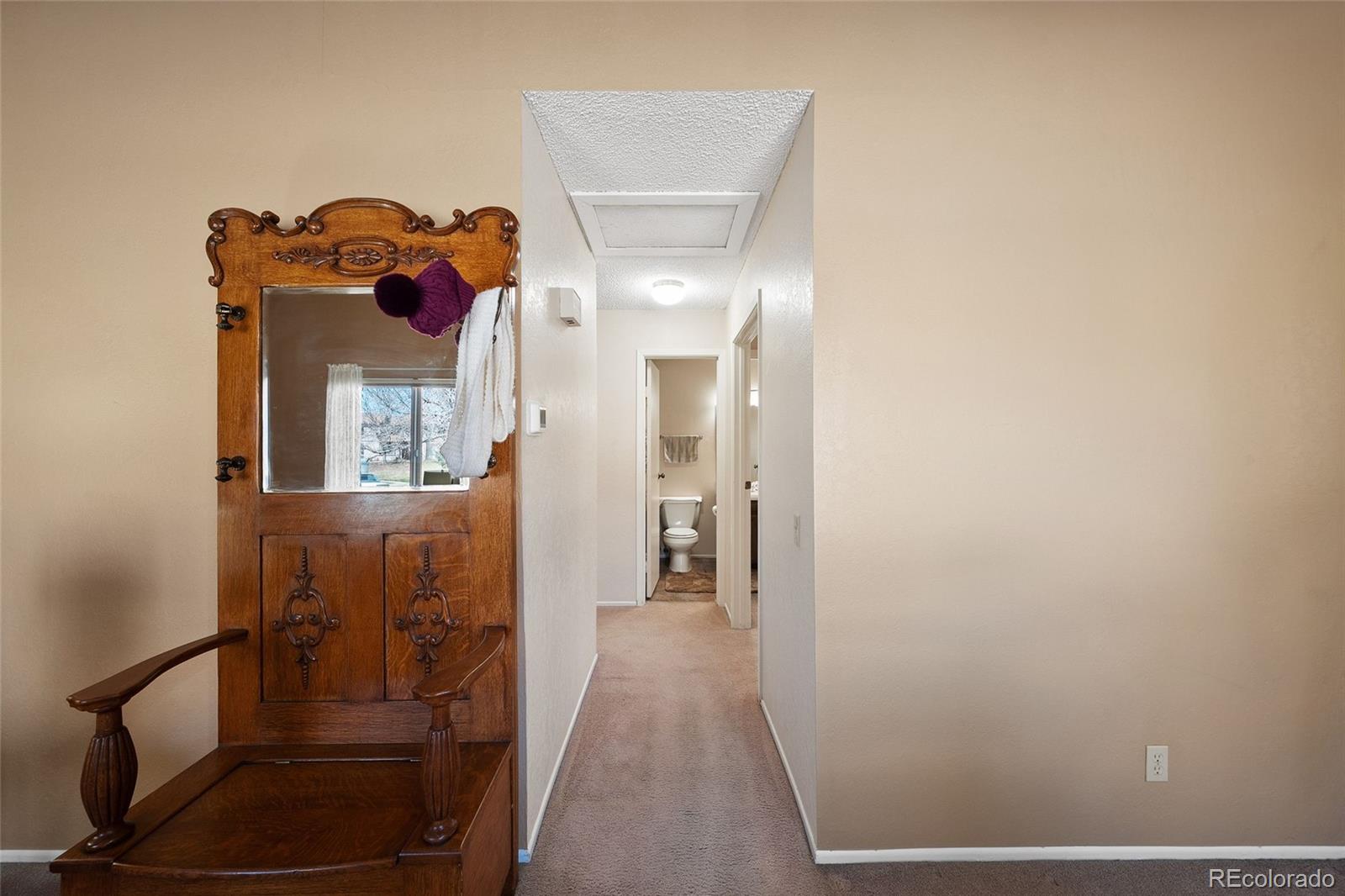 3657 South Laredo Street, Unit A Aurora, CO 80013 - Photo 19 of 26 a view of a hallway with interior of the house