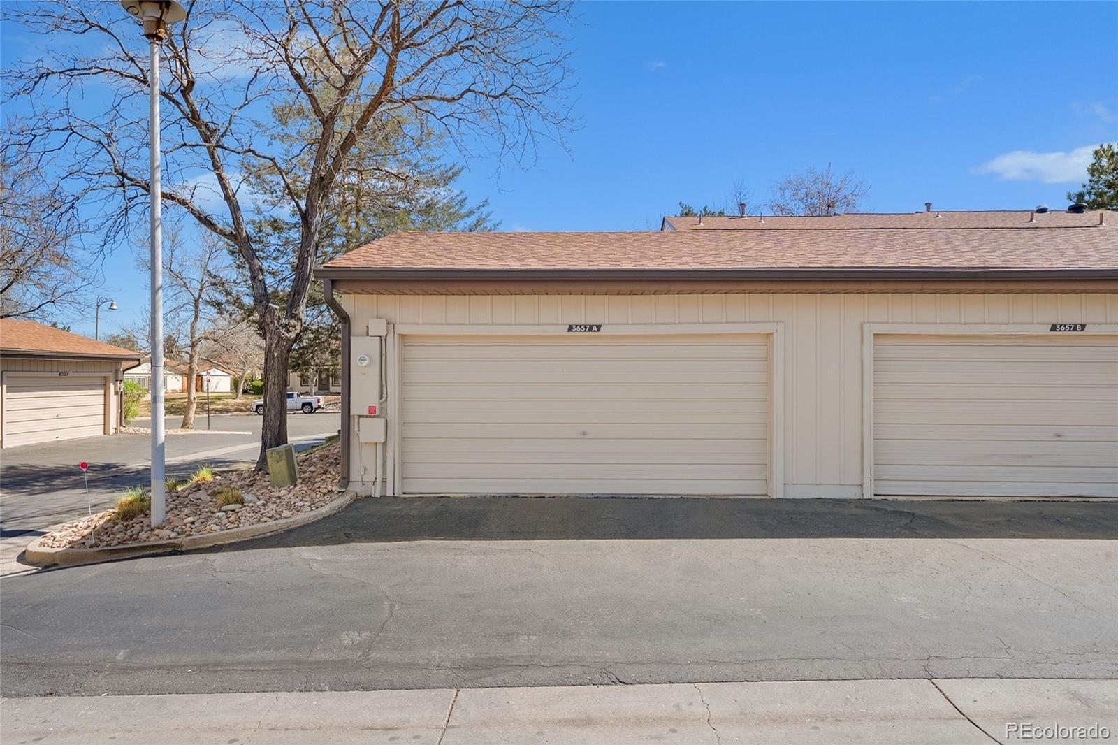 3657 South Laredo Street, Unit A Aurora, CO 80013 - Photo 20 of 26 front view of a house