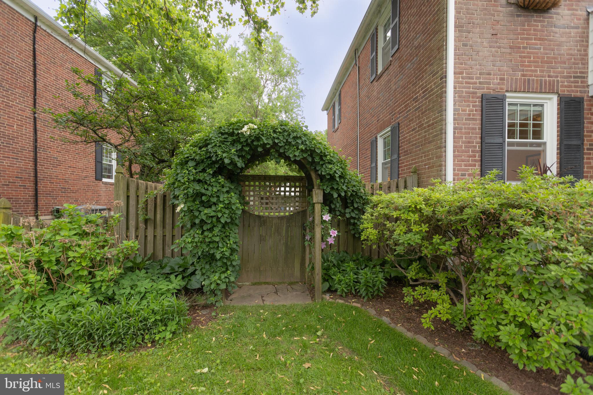 85 Murdock Road Baltimore, MD 21212 - Photo 3 of 36 Arbor leading to the side yard