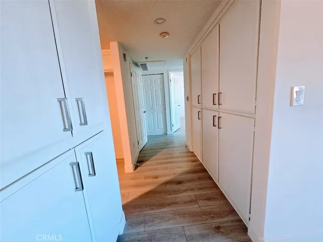 a bathroom with a toilet sink and a mirror