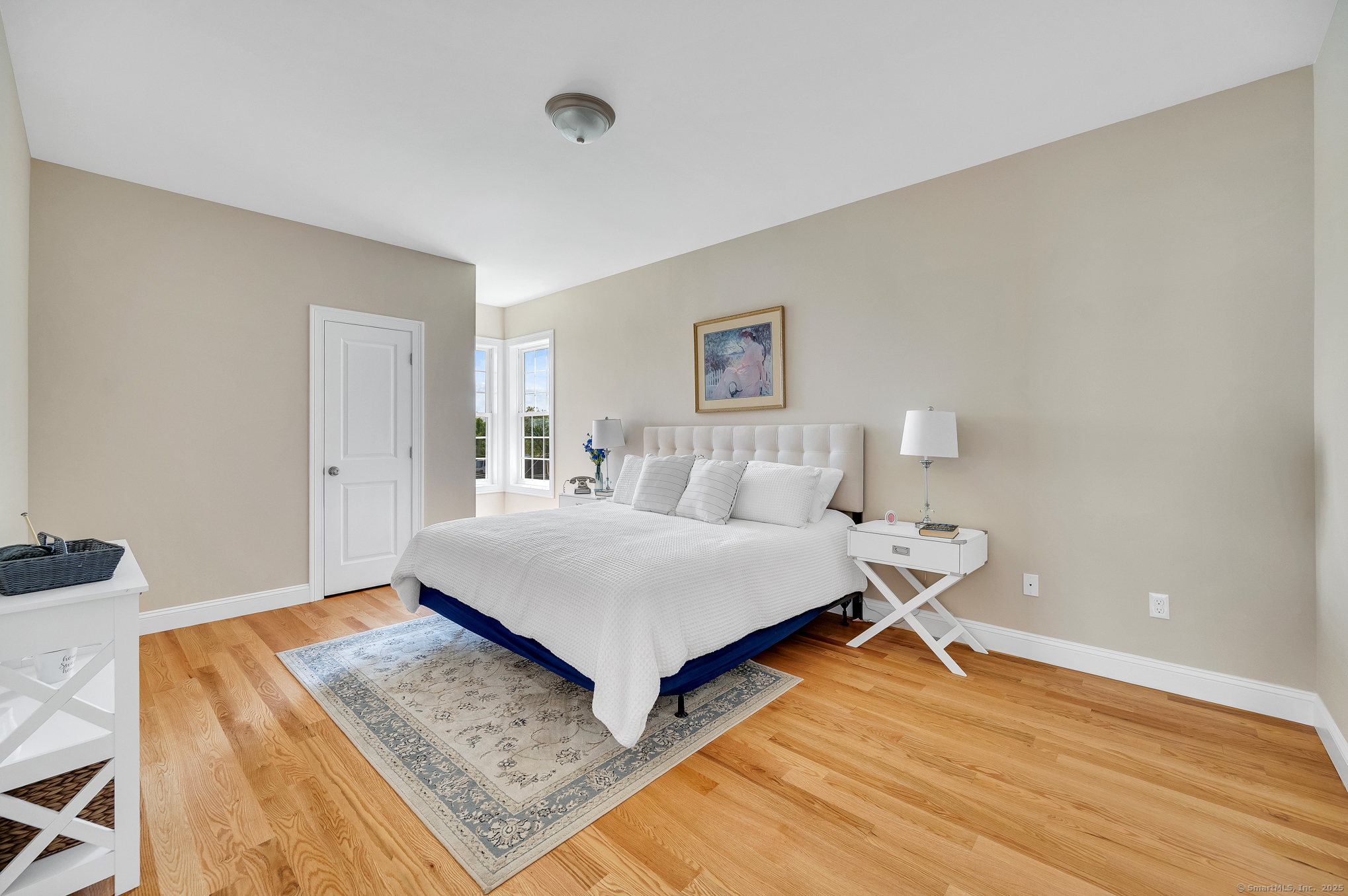 128 Webster Lane Middletown, CT 06457 - Photo 13 of 21 a bedroom with a bed and a table in it