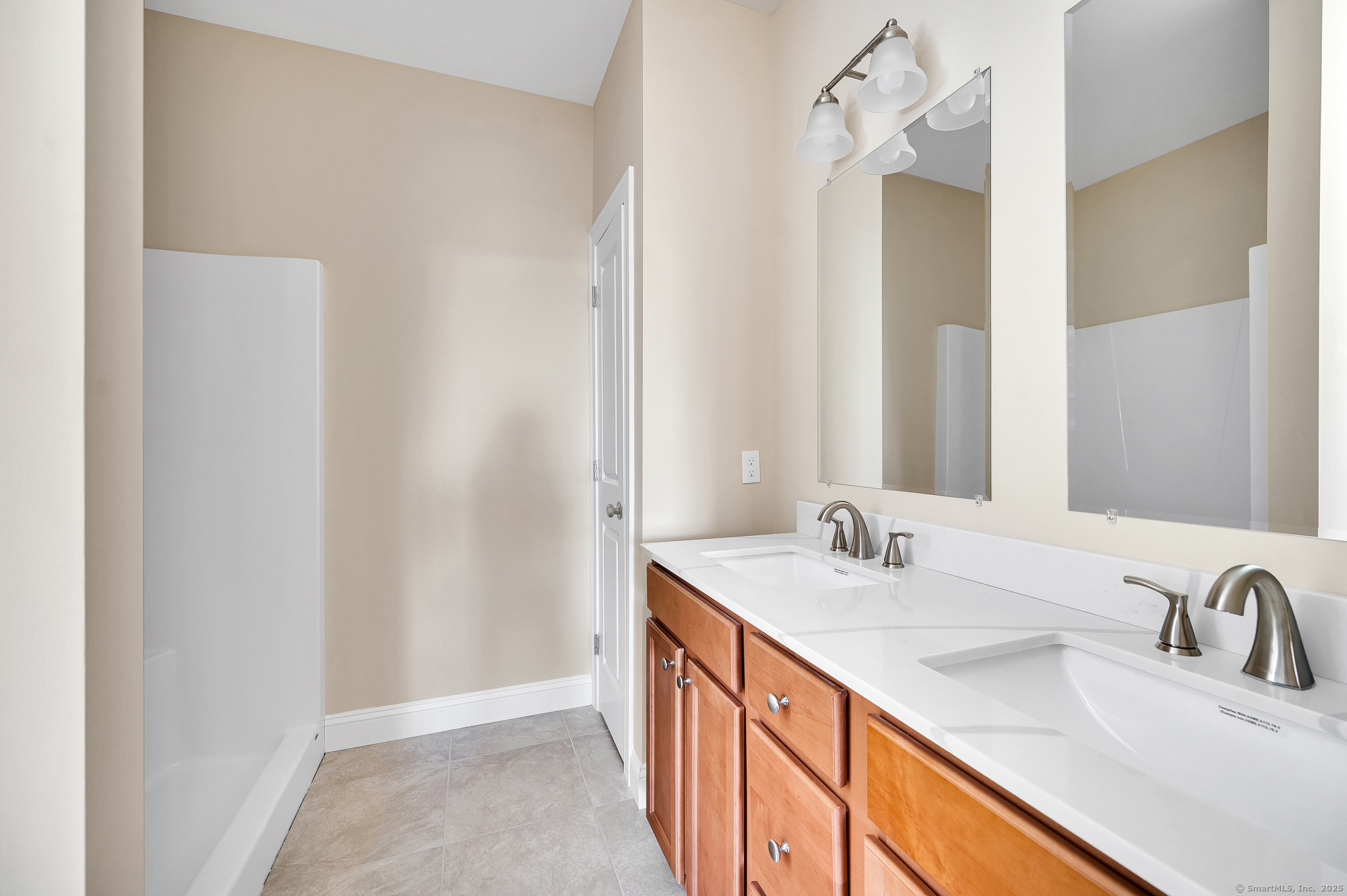 128 Webster Lane Middletown, CT 06457 - Photo 14 of 21 a bathroom with a double vanity sink and a mirror