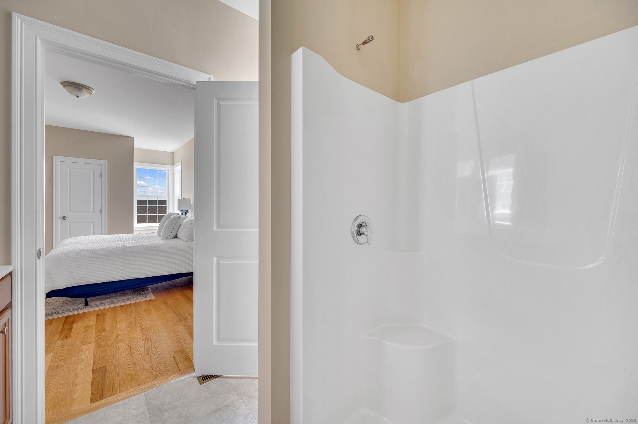 128 Webster Lane Middletown, CT 06457 - Photo 15 of 21 a en suite bathroom with a granite countertop sink and mirror