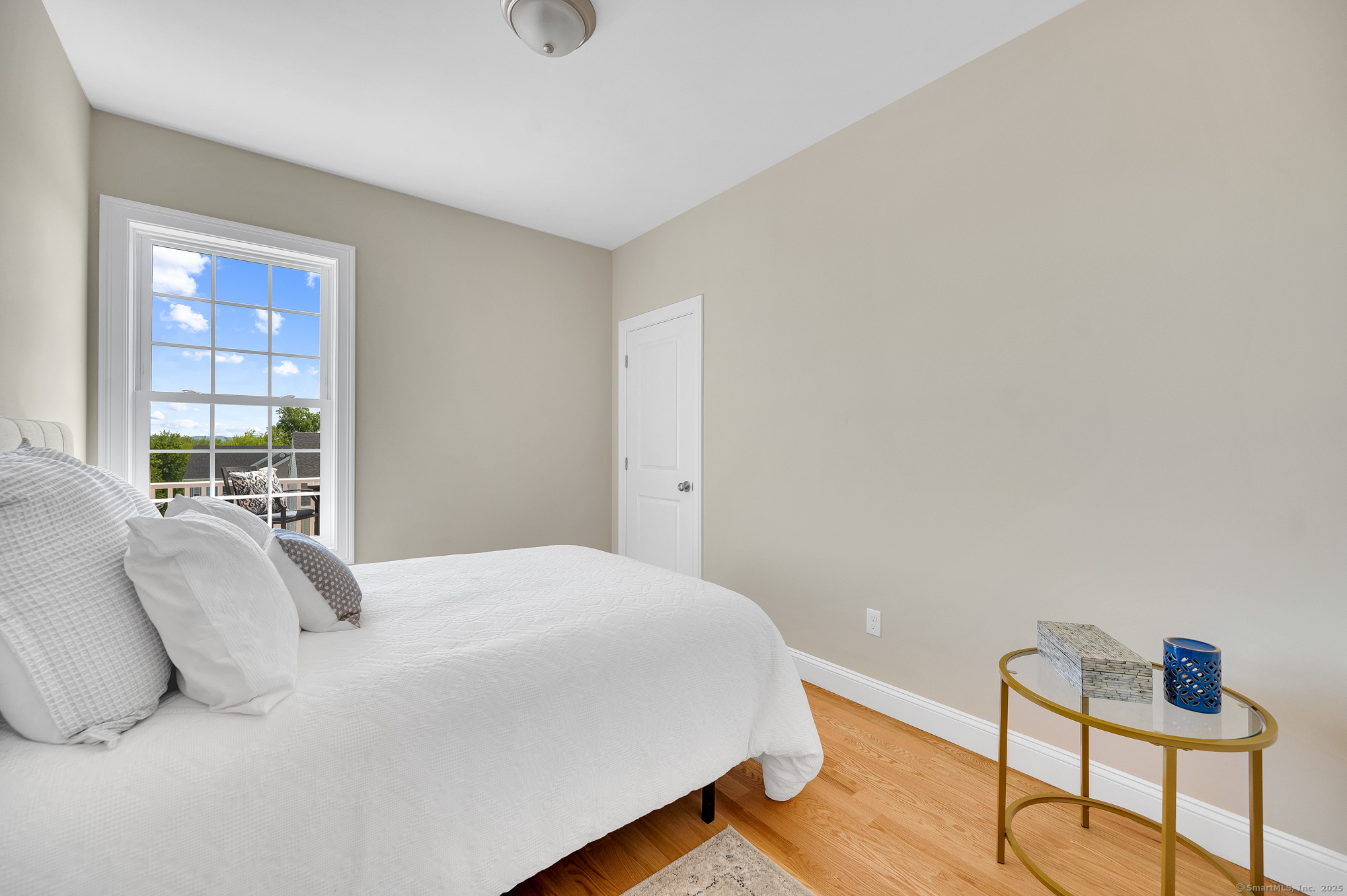 128 Webster Lane Middletown, CT 06457 - Photo 17 of 21 a bedroom with a bed and a window