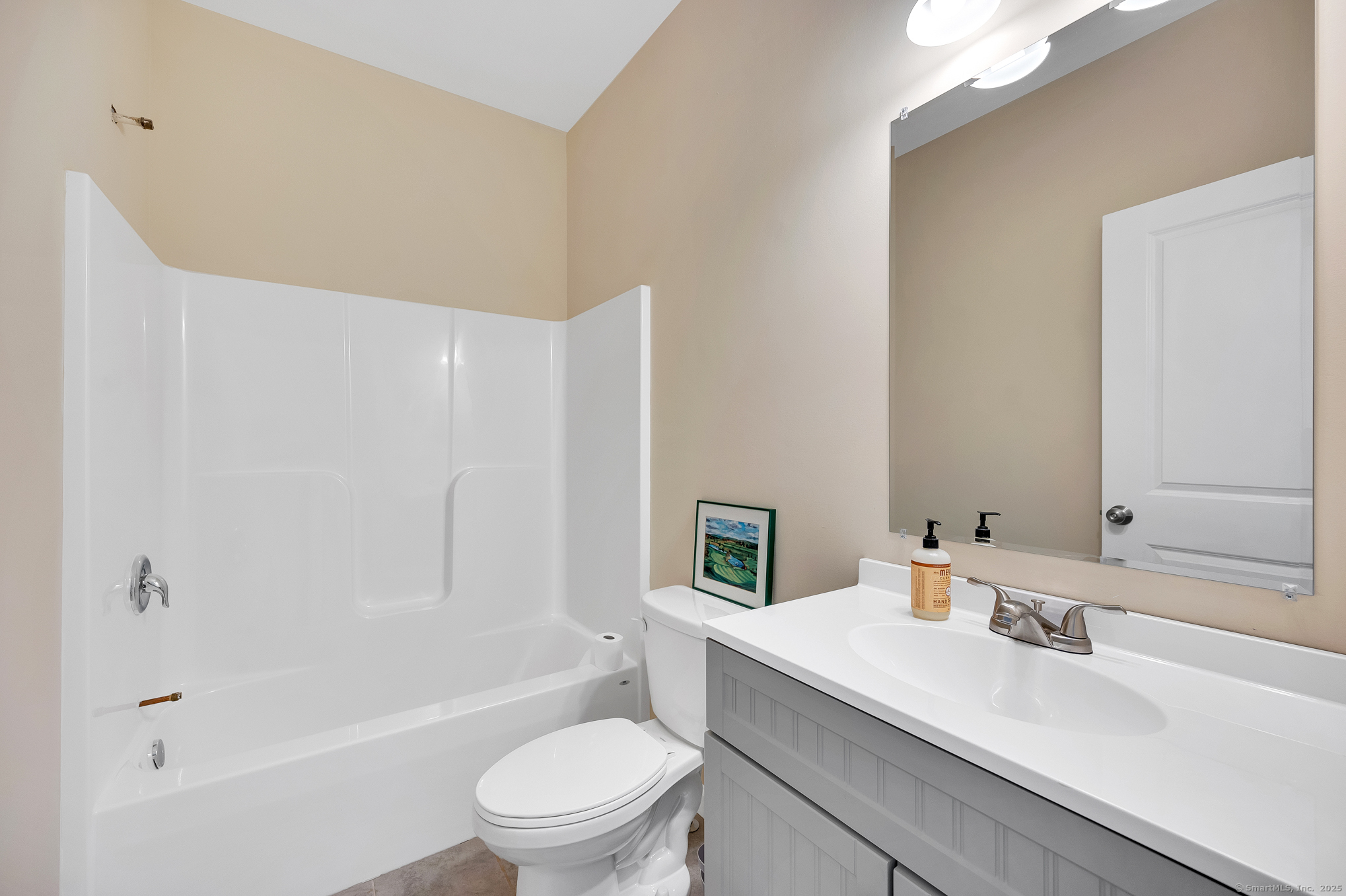 128 Webster Lane Middletown, CT 06457 - Photo 19 of 21 a bathroom with a sink a toilet and shower