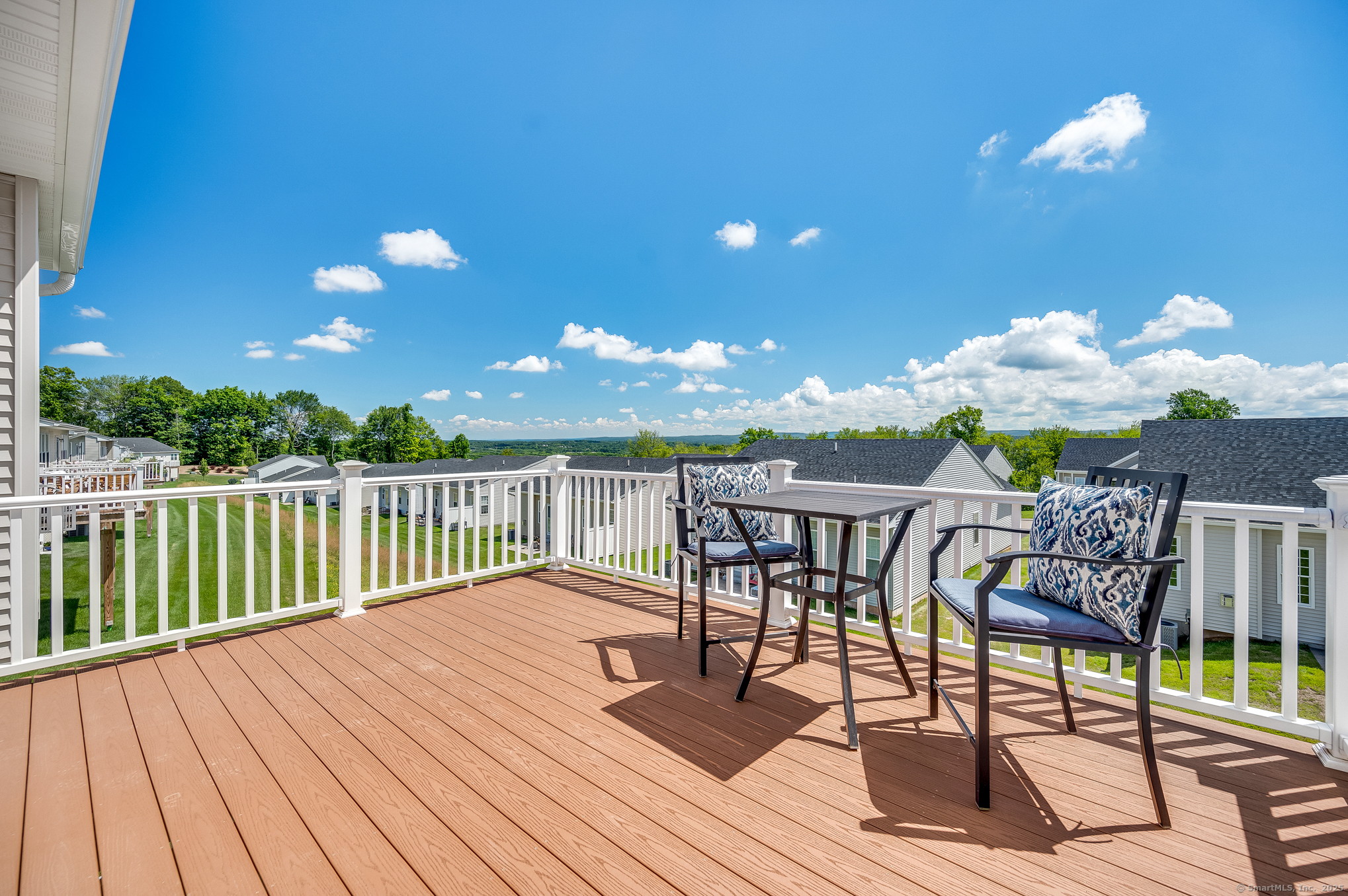 128 Webster Lane Middletown, CT 06457 - Photo 2 of 21 a view of a balcony with furniture and wooden floor
