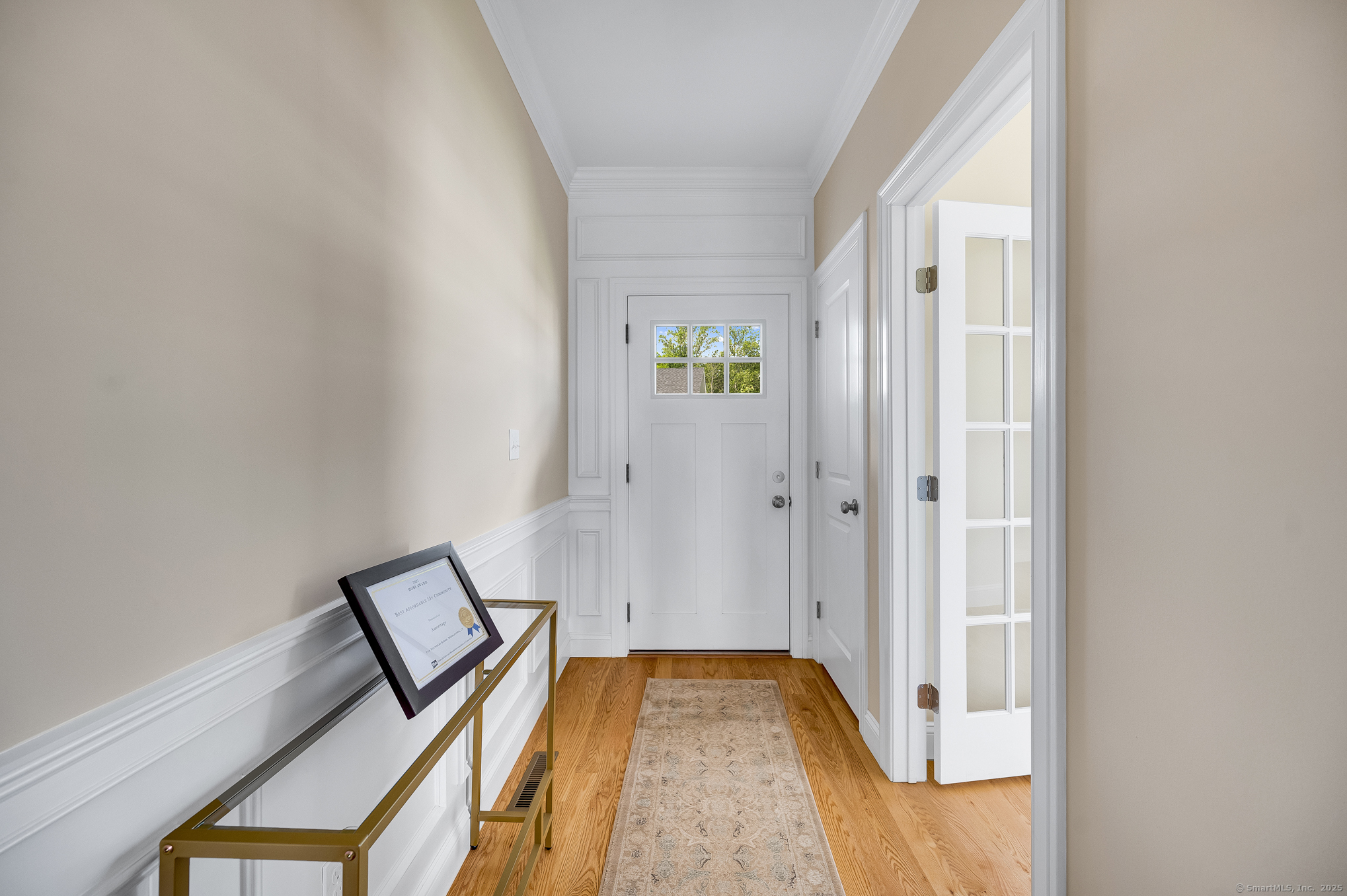 128 Webster Lane Middletown, CT 06457 - Photo 3 of 21 a view of bedroom with a bed and wooden floor