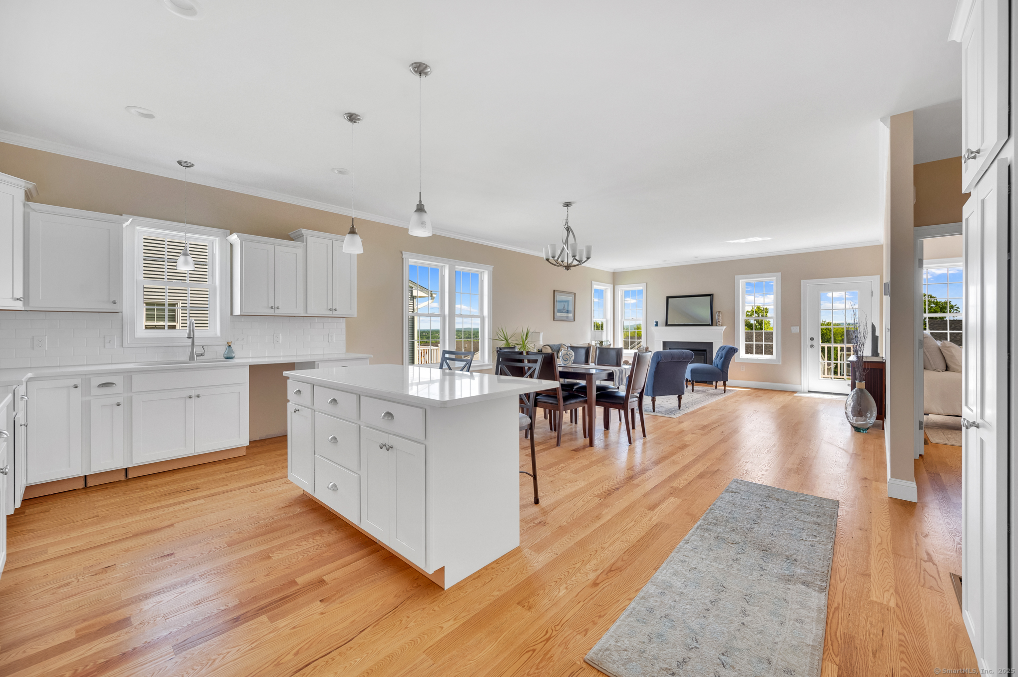 128 Webster Lane Middletown, CT 06457 - Photo 7 of 21 a large white kitchen with lots of counter space a sink and appliances