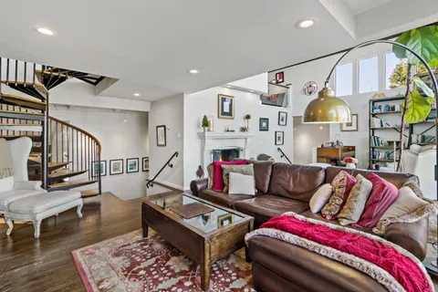 a kitchen with sink stove and cabinets