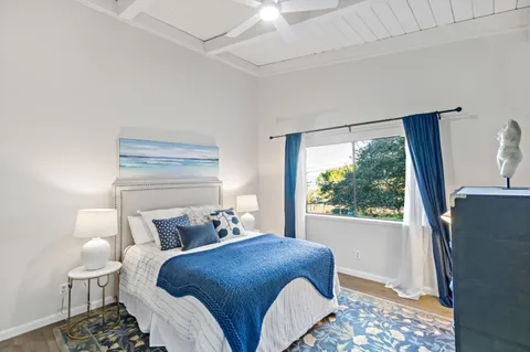 a balcony view with a seating space