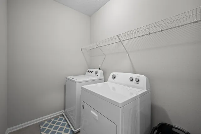 a view of house with outdoor space and sitting area